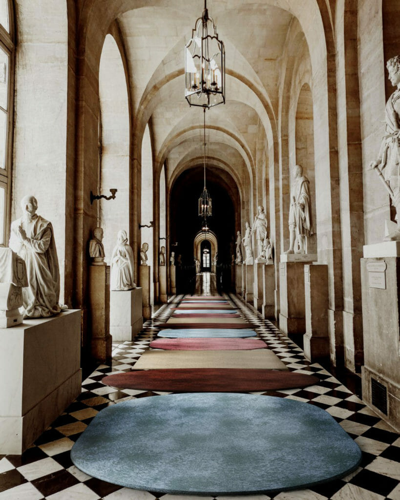 How To Layer Rugs? Hallway Of Colorful Rugs 