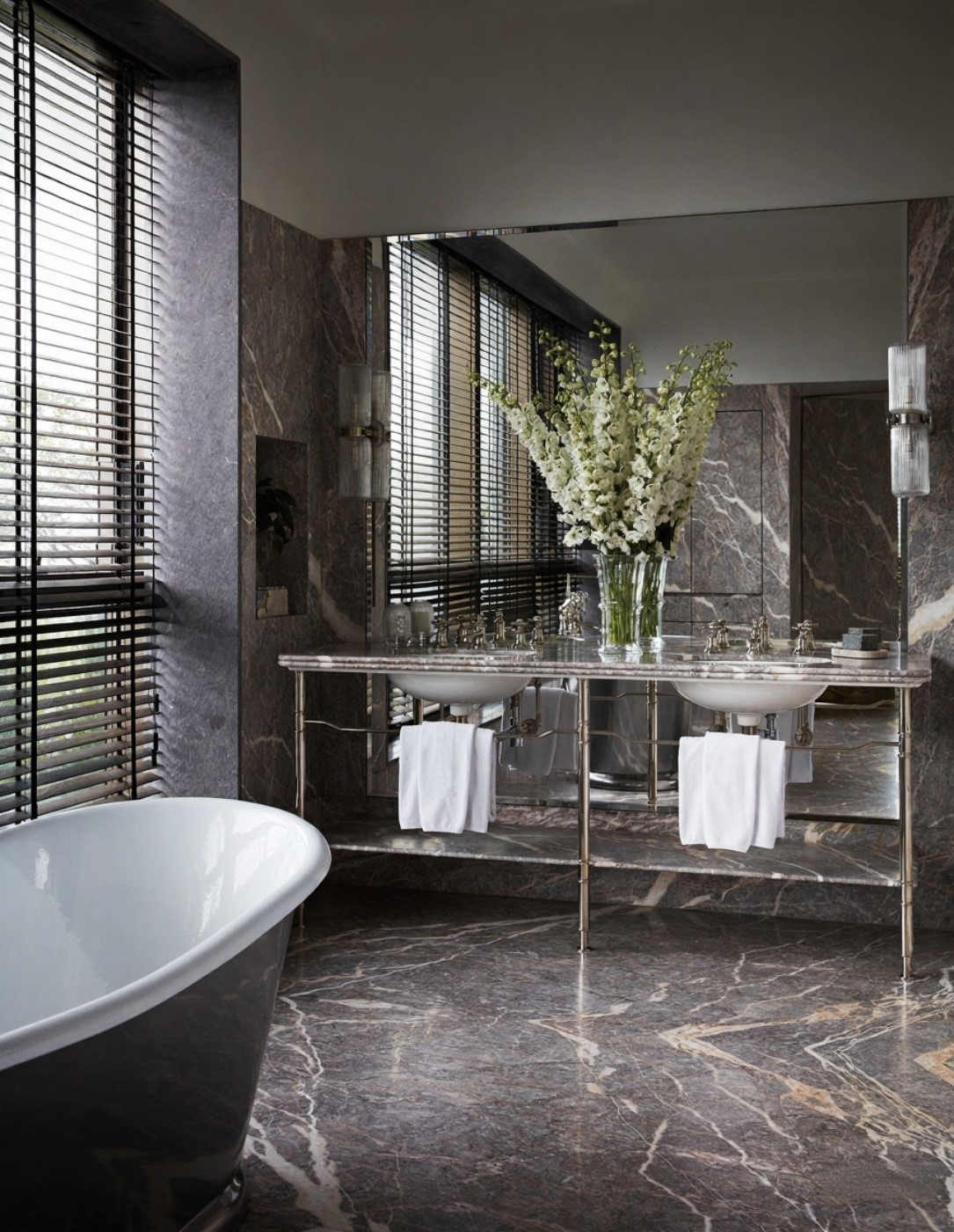 The Master Bathroom Feels Like A Private Spa, Enveloped In Luxurious Marble That Stretches Seamlessly Across Floors And Walls.