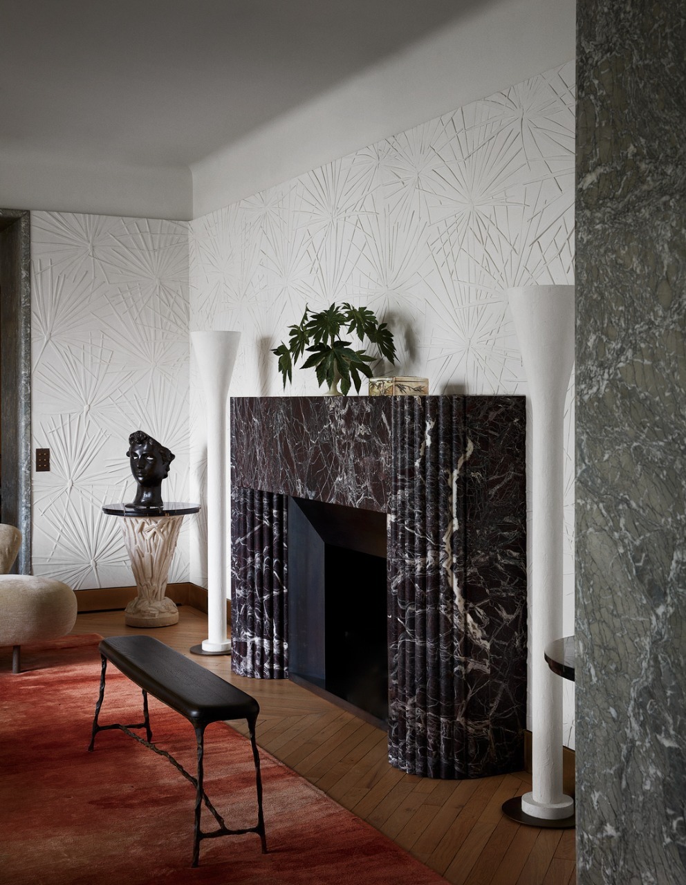 Patterned Rugs And Asian Motifs Bring This Luxury Home To Life. The Living Room Combines Natural Materials With Artistic Detail. A Patterned Rug Inspired By Asian Botanical Prints Anchors The Space.