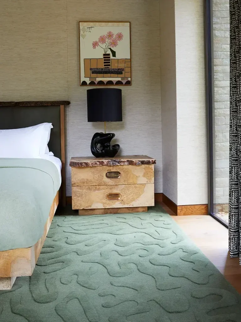 Bedroom Decor With A Green Rug By Adri + Dahlman Interiors