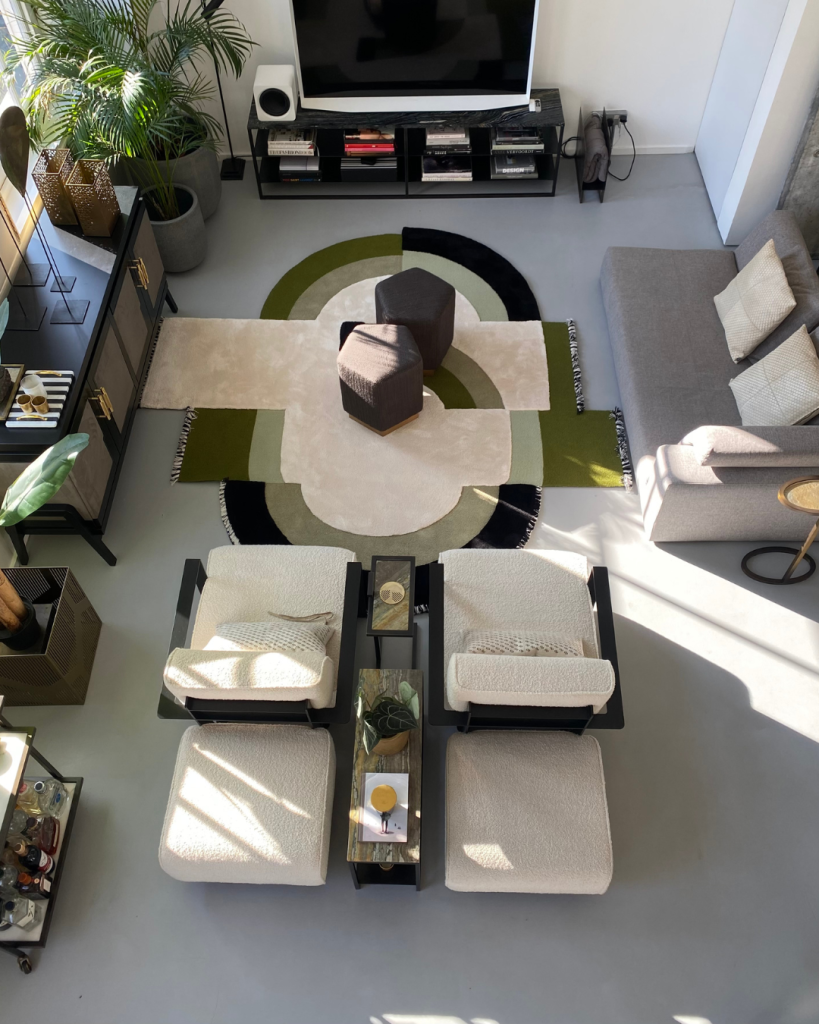 Panoramic View Of A Contemporary Living Room With Neutral Tones And Greens Hues