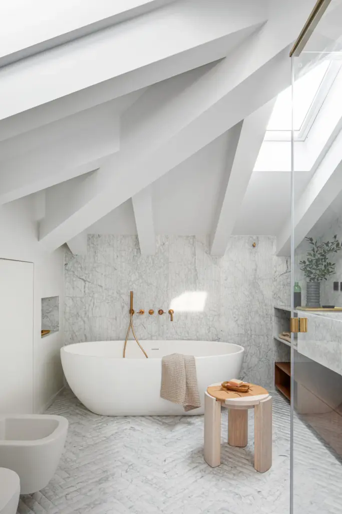 Bathrooms In Italian Home Decor Are Often Small But Luxurious. The Villa Features A Carrara Marble Bathroom With Bronze Hardware. Textures, From Smooth Marble To Soft Towels, Create A Sense Of Indulgence.