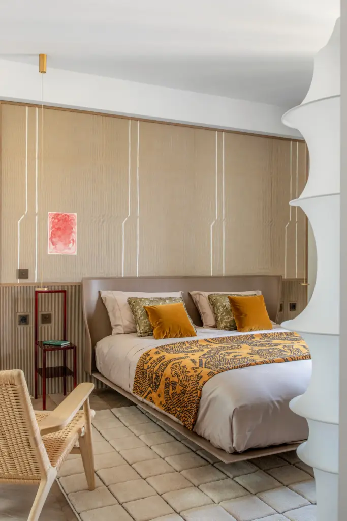The Bedroom Is A Key Space For Italian Home Decor. A Carefully Chosen Rug Sits Under The Bed, Adding Warmth And Texture. Soft Bedding, Layered Fabrics, And Textured Throws Create A Warm And Inviting Atmosphere.
