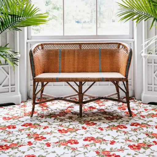 Spring Decor: Rattan Bench, Blooming Floral Rug, And Lush Palms Create A Bright, Airy Space. Fresh And Inviting.