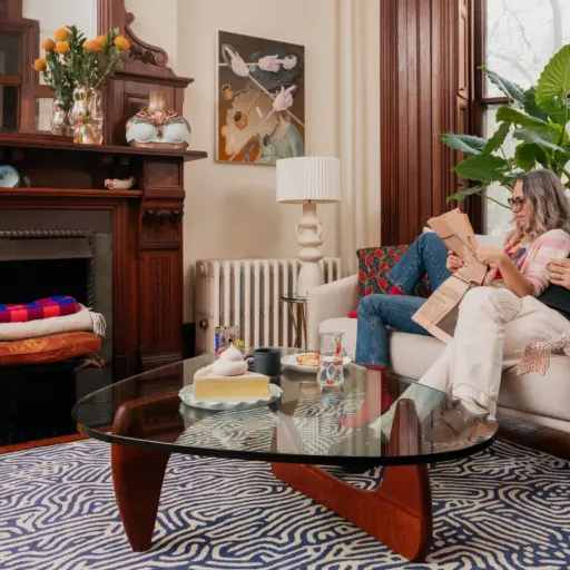 Eclectic Brooklyn Brownstone Interior: Pink Chair, Bold Rug, Ornate Fireplace. Artful Mix Of Styles &Amp; Textures In A Cozy, Lived-In Space.