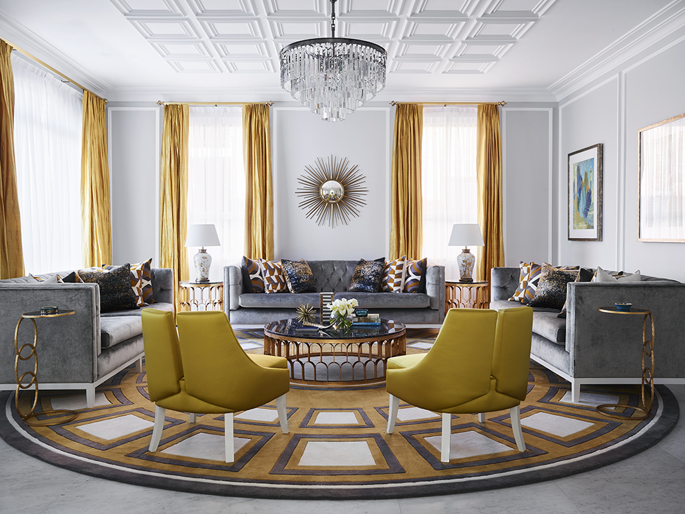 Living Space With Greys And Mustards Tones And A Art Deco Rug