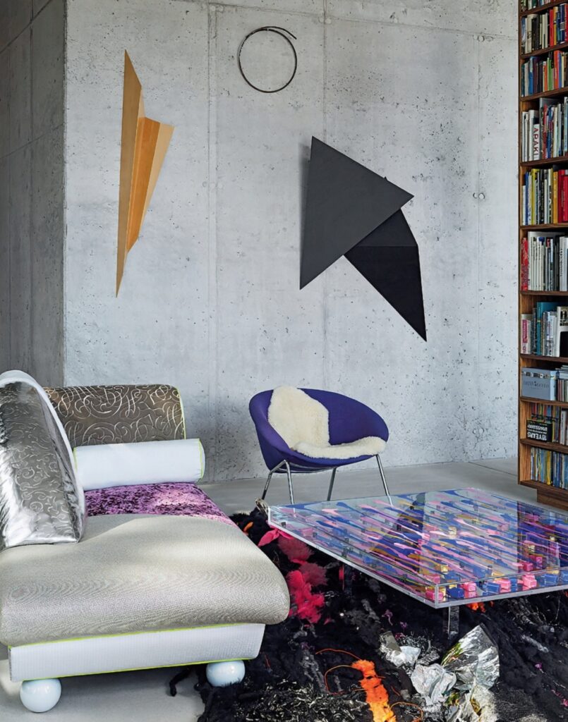Water Harbor: Where Art, Water, And Industrial Interior Design Meet, Sitting Area With Unique Rug And Designer Furniture